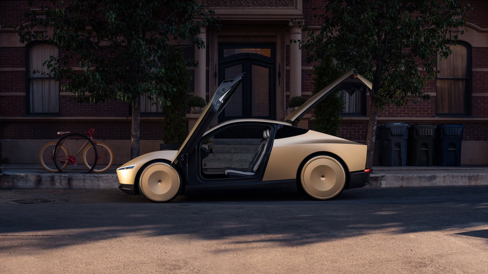 Tesla Cybercab robotaxi with butterfly doors open, showing the two seat interior with no steering wheel