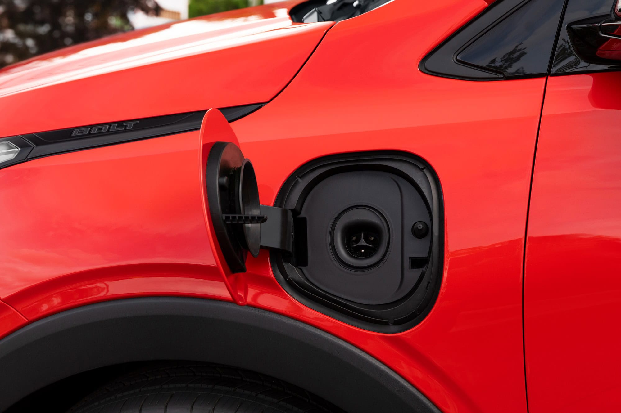 2027 Chevrolet Bolt native NACS charge port with the door open