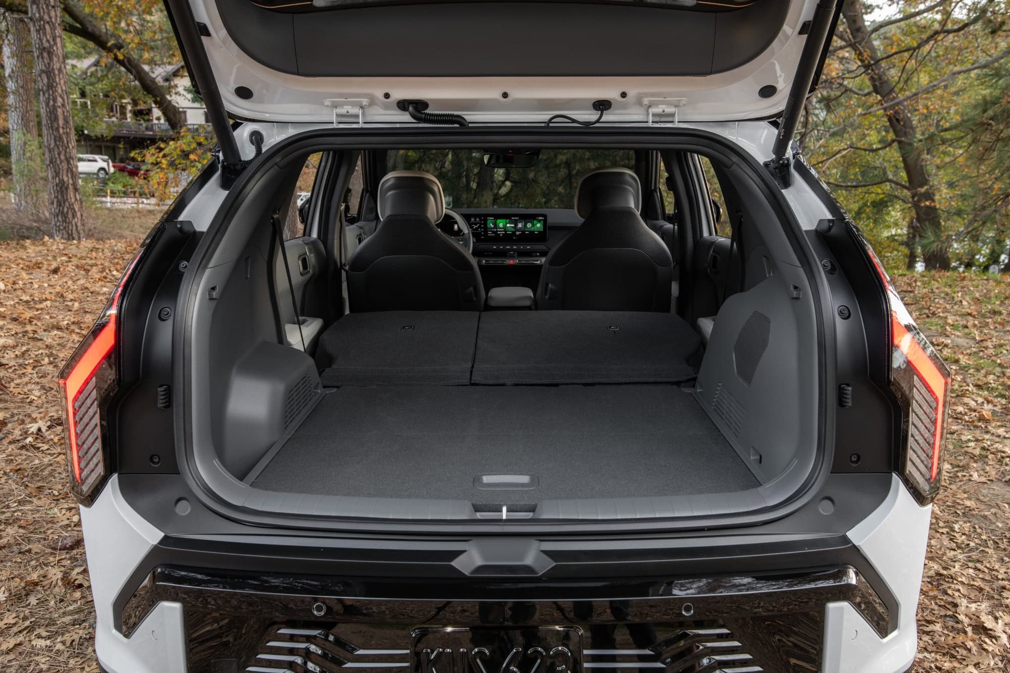 2027 Kia EV3 cargo area with the rear seats folded flat