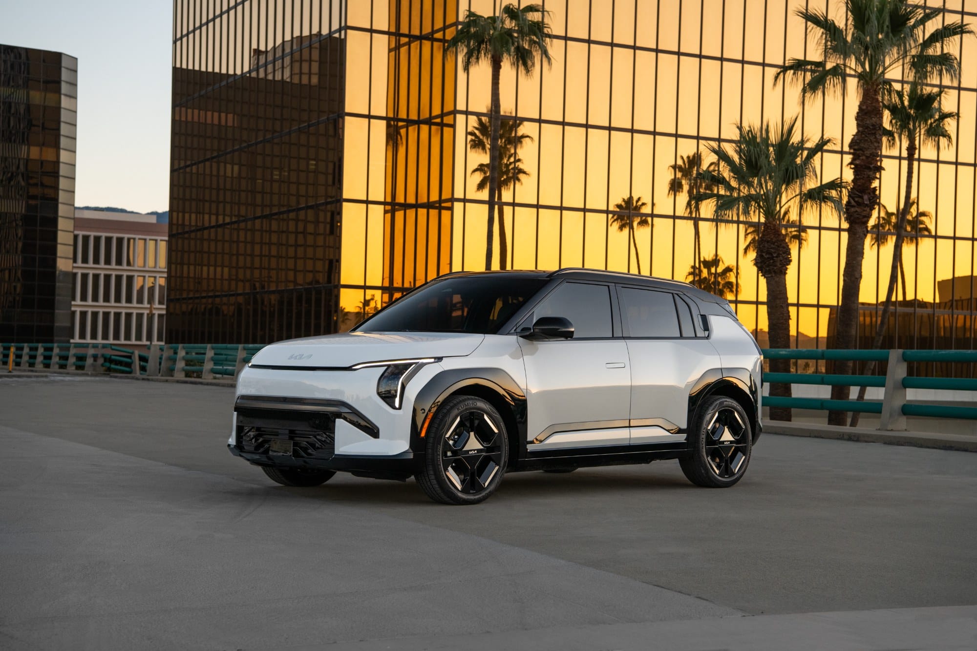 2027 Kia EV3 in white, front three quarter view, parked
