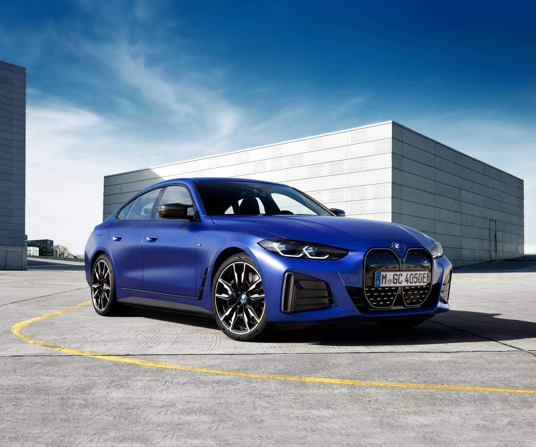 BMW i4 M50 in blue, front three quarter view