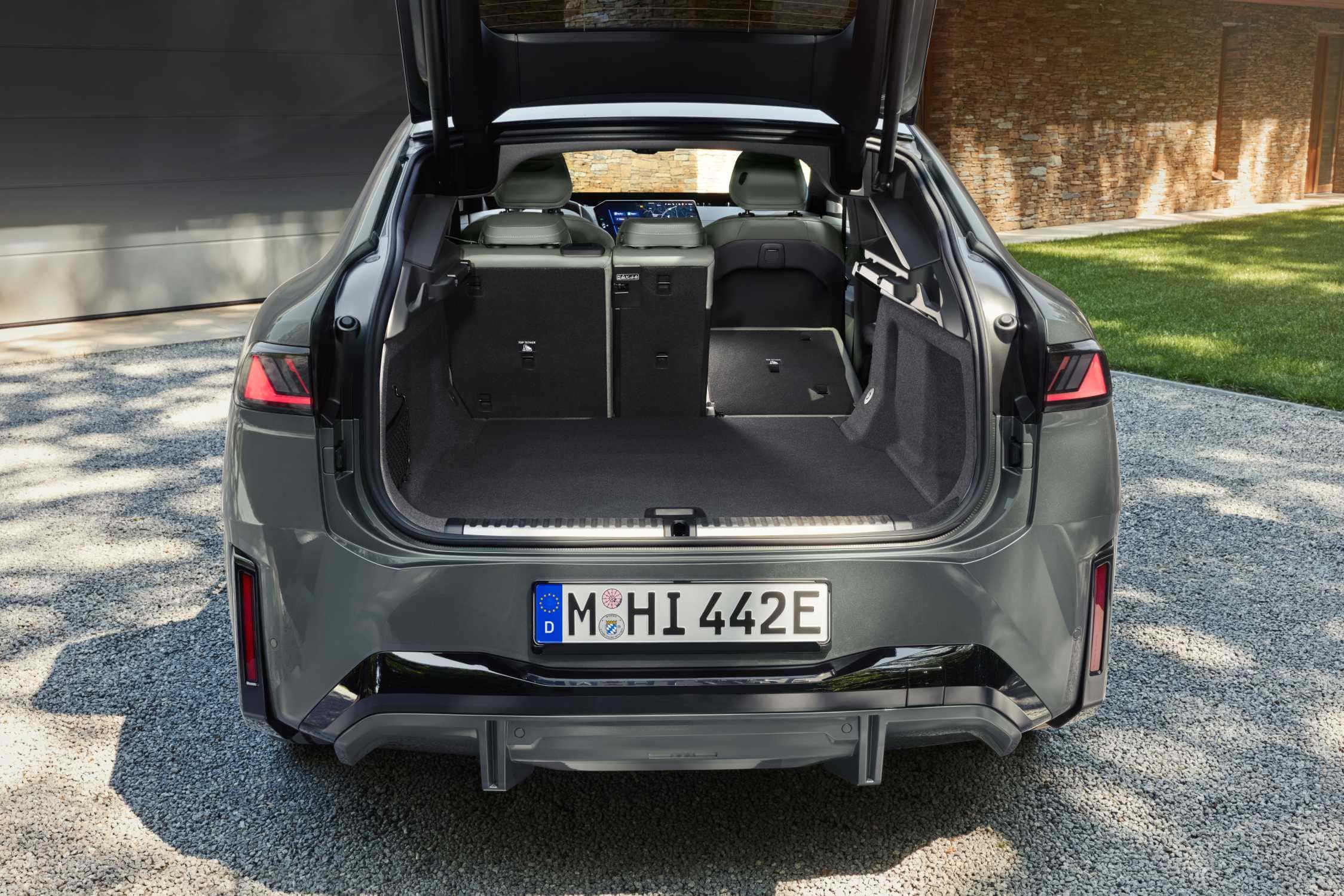 BMW iX4 cargo area with rear seats folded
