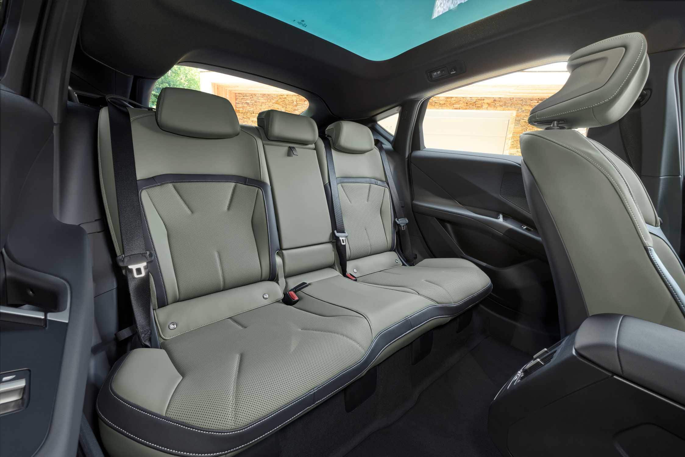 BMW iX4 rear seat under the panoramic sunroof