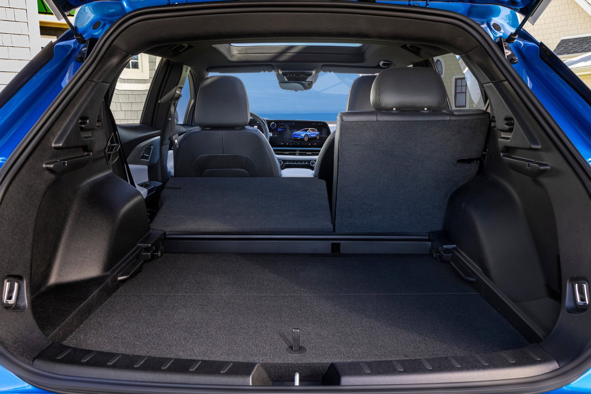 Chevrolet Equinox EV cargo area with the hatch open and rear seats up