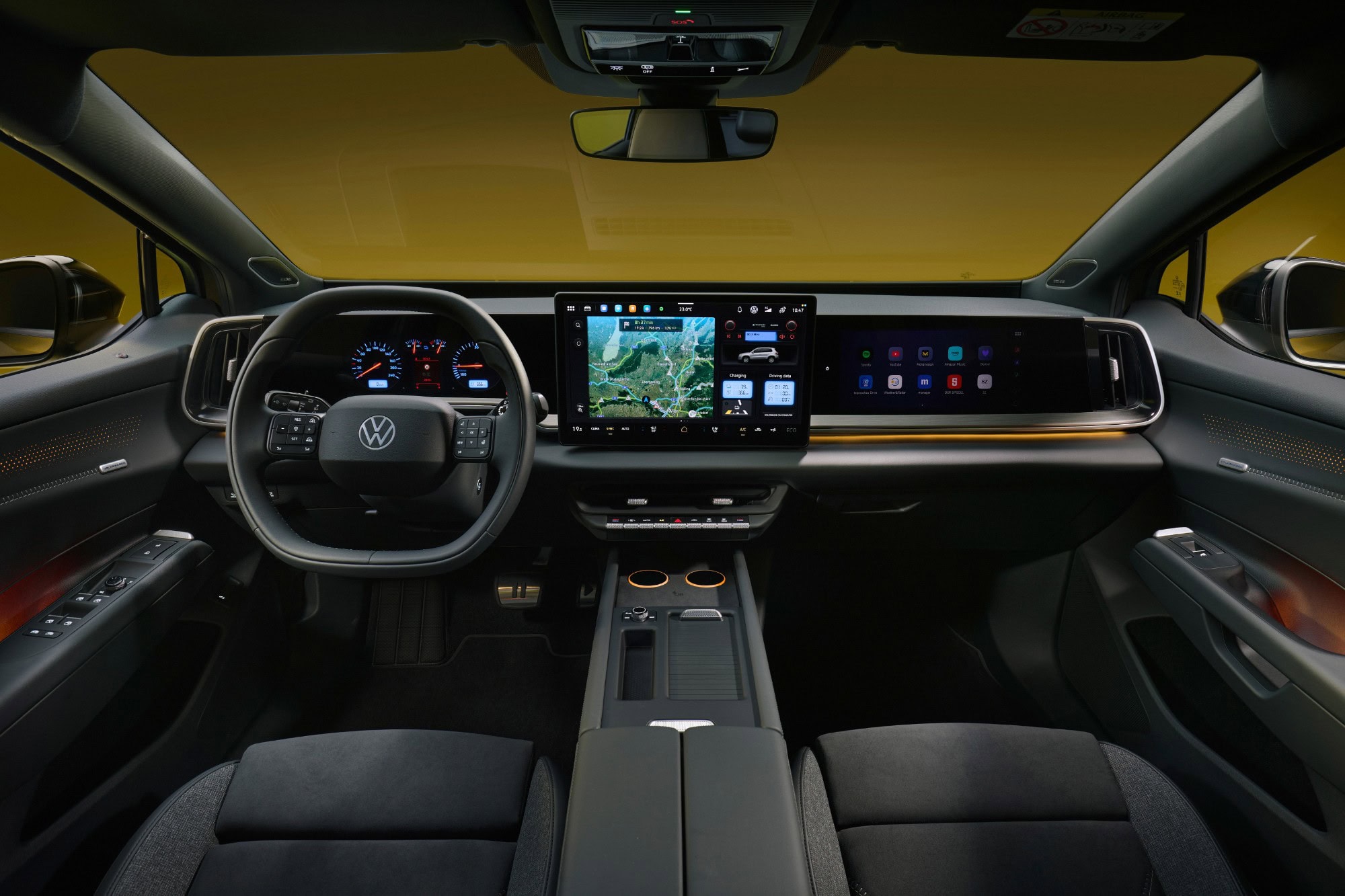 Volkswagen ID. Tiguan dashboard with the 15 inch center display, 10 inch driver display, and passenger display