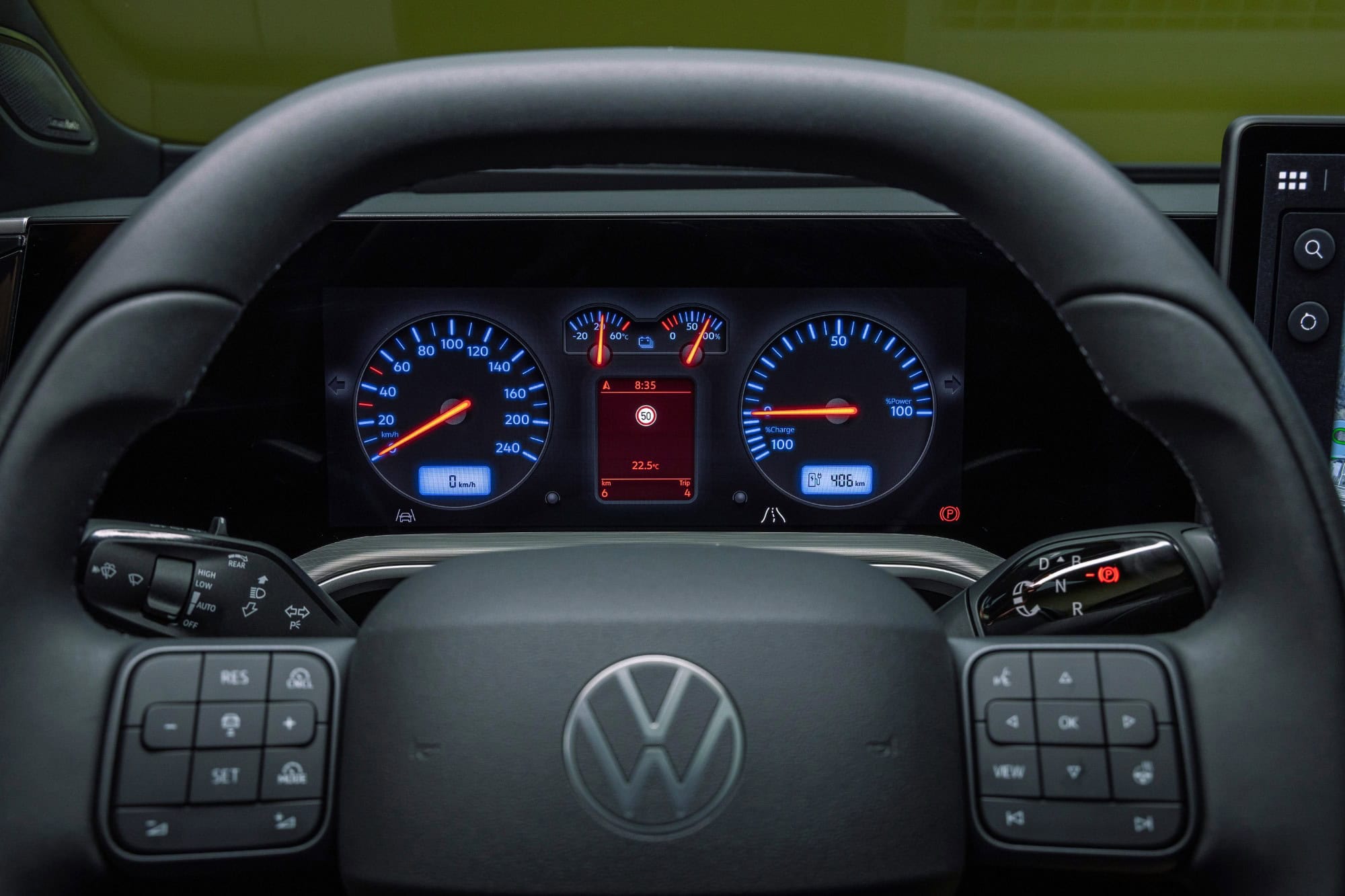 Volkswagen ID. Tiguan steering wheel with physical buttons and the Retro Golf IV gauge display